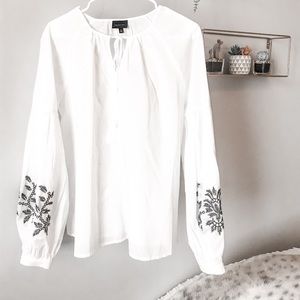 White with black stitching design blouse